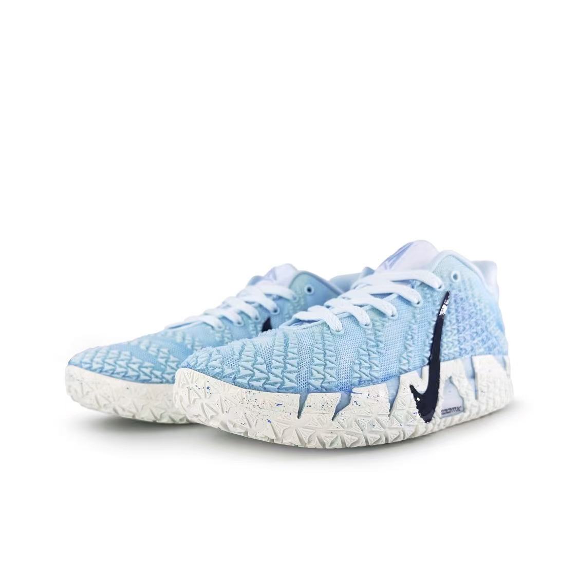 Pair of customized Nike Ja 3 'Ice Blue' basketball shoes with white laces and speckled white soles, front three-quarter view